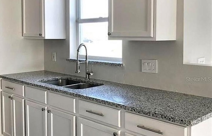 Granite counter with undermount sink and square edge